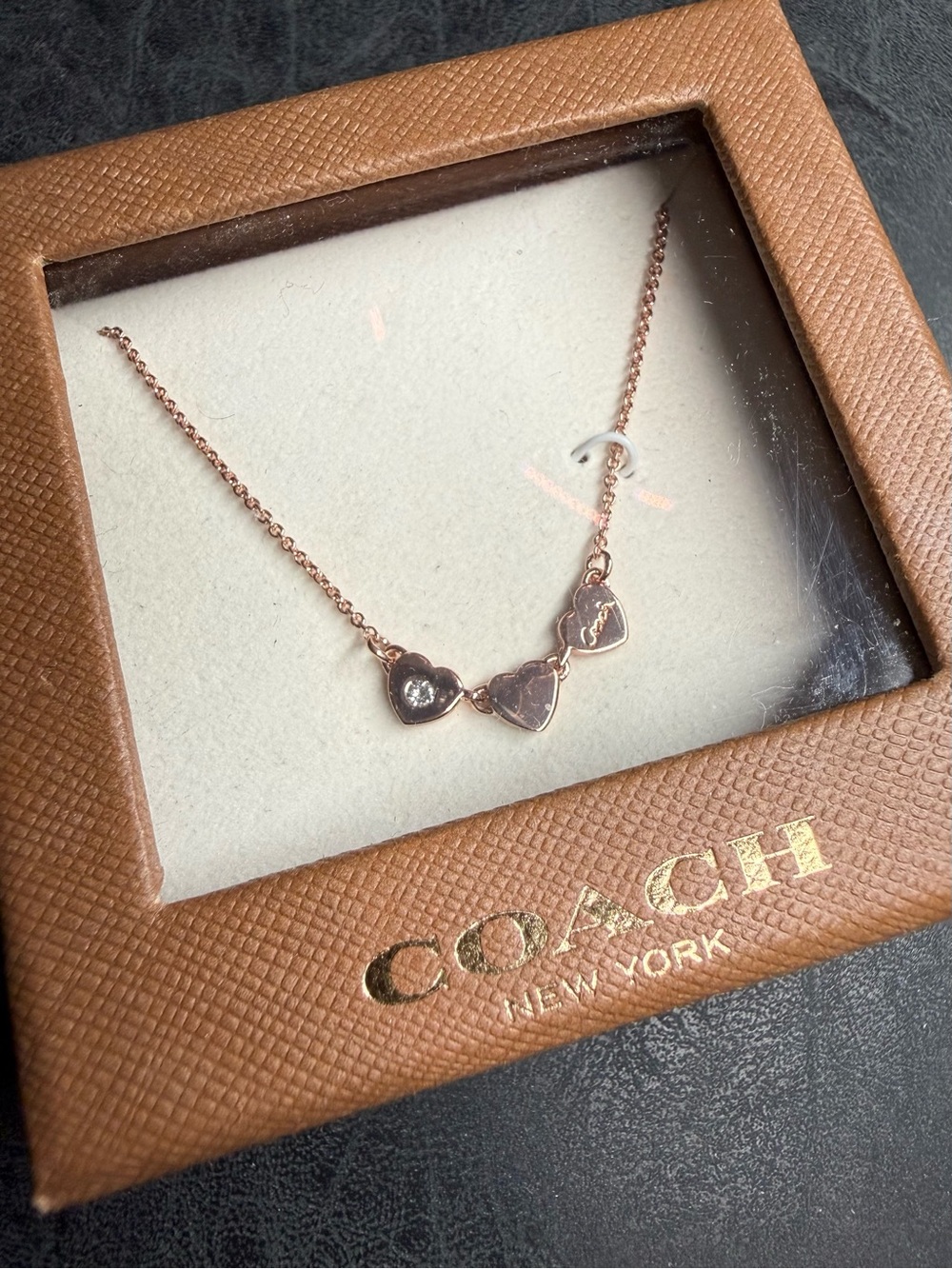 Coach Rose Gold Three-Heart Pendant Necklace with Crystal Accent